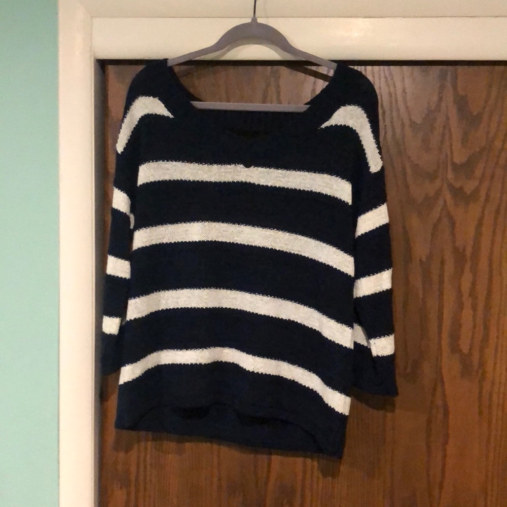 Blue and white striped sweater.